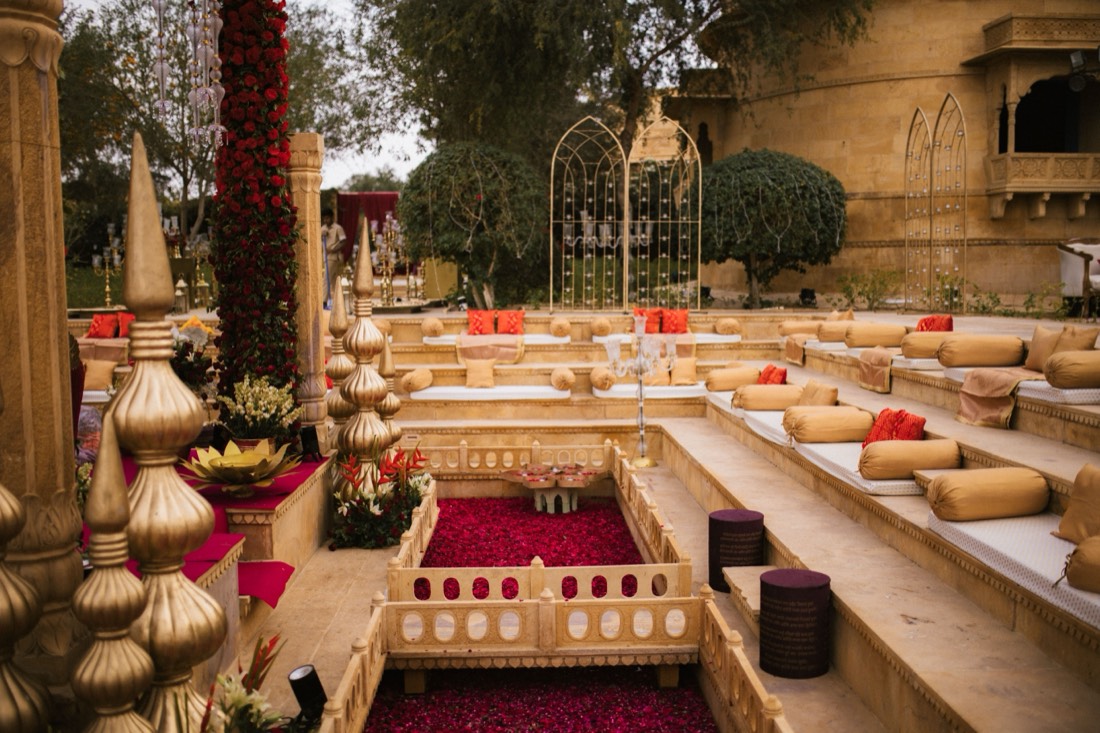 Royal red rose mandap styling for a destination wedding by SGR Decorators