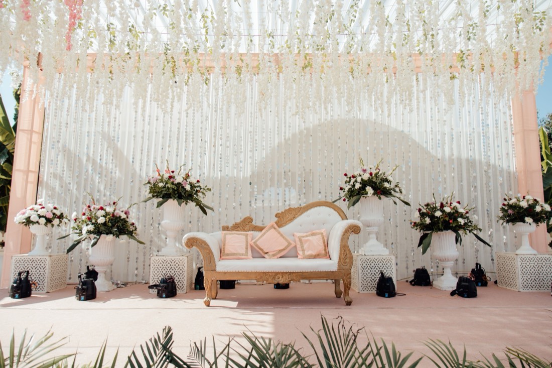Styled table detail with candles and florals by SGR Decorators